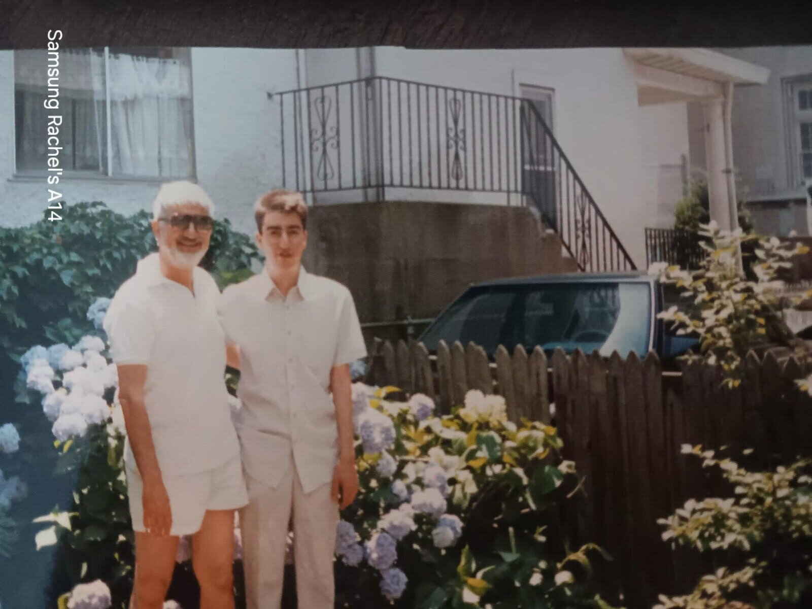 Ray and Soren in the garden at 2410 Glenwood Road.